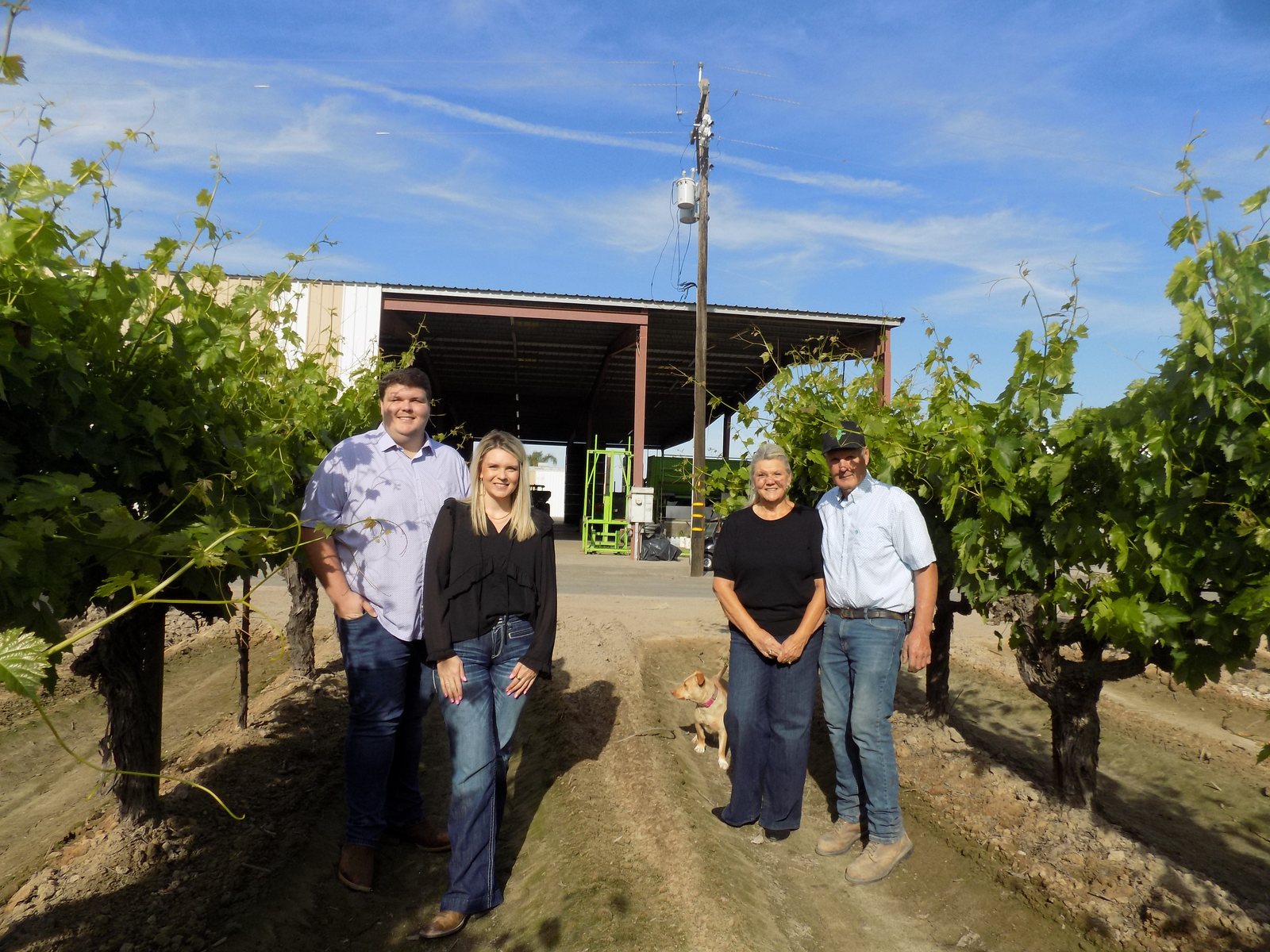 Kristie and Steve Reitz with their grown children, Robbie and Leslie, who plan to keep the family farm going after Steve retires.