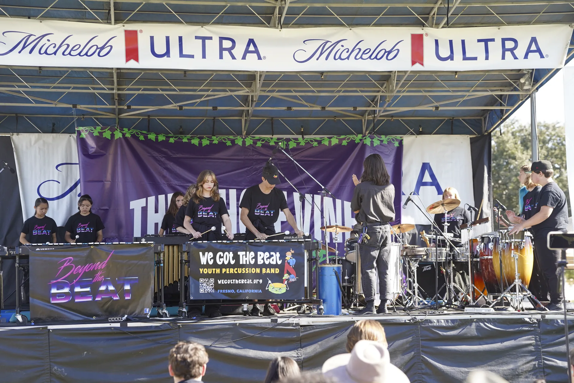 We Got The Beat youth percussion band performing on the Whole Vine Festival stage.